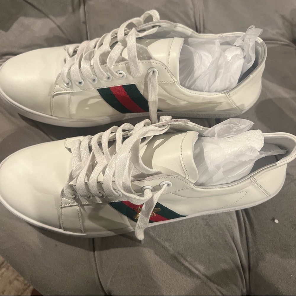 Brand new men Gucci sneakers. Size 46. Never worn. No box only cloth bag.